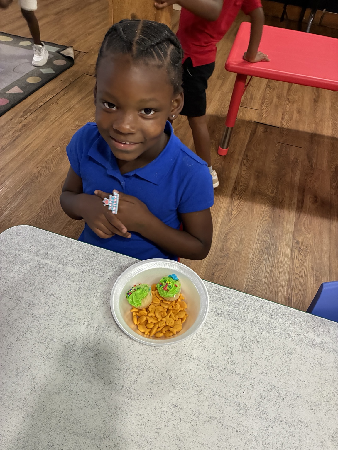 Child enjoying a classroom celebration